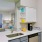a kitchen with white cabinets