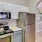 a kitchen with white cabinets